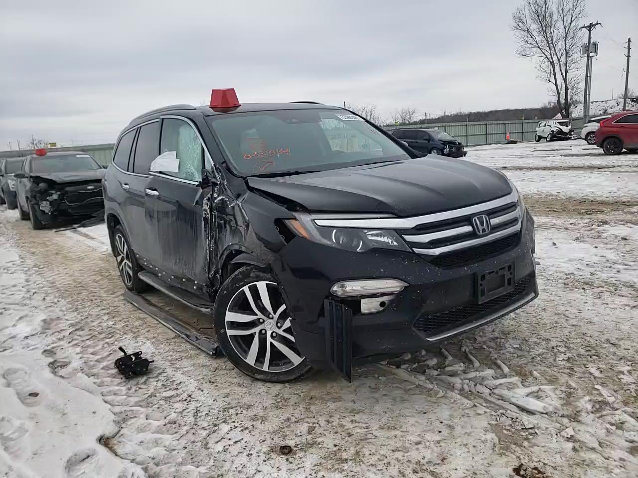 2018 HONDA PILOT ELIT 5FNYF6H09JB038354