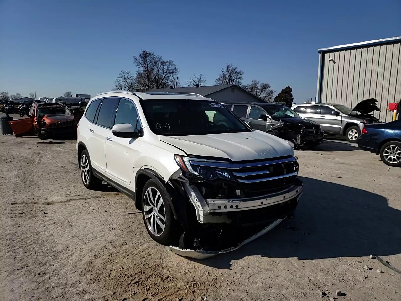 2017 HONDA PILOT ELIT 5FNYF6H02HB016335