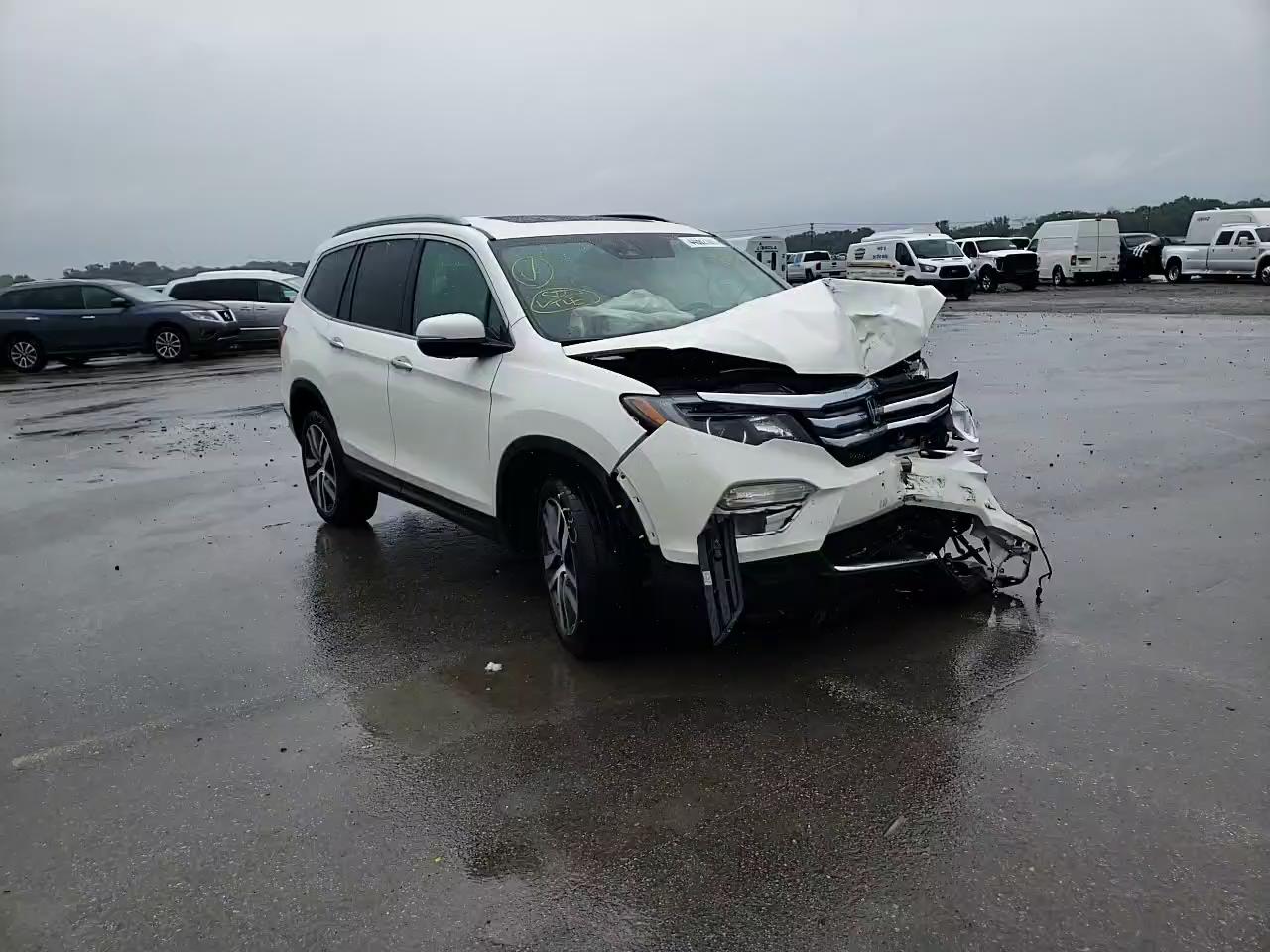 2017 HONDA PILOT ELIT 5FNYF6H05HB022095