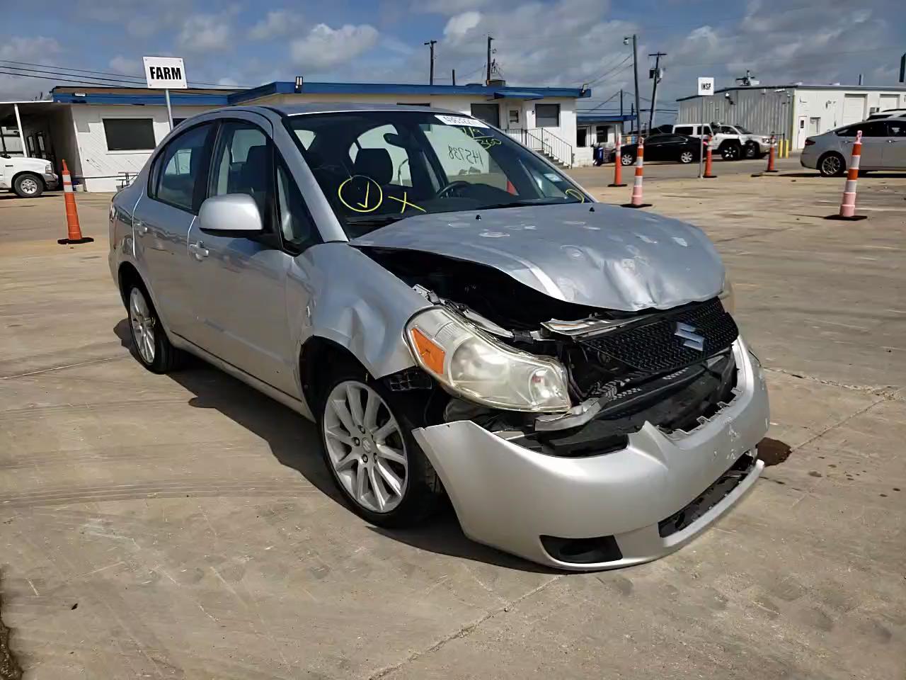 2011 SUZUKI SX4 LE JS2YC5A26B6300378