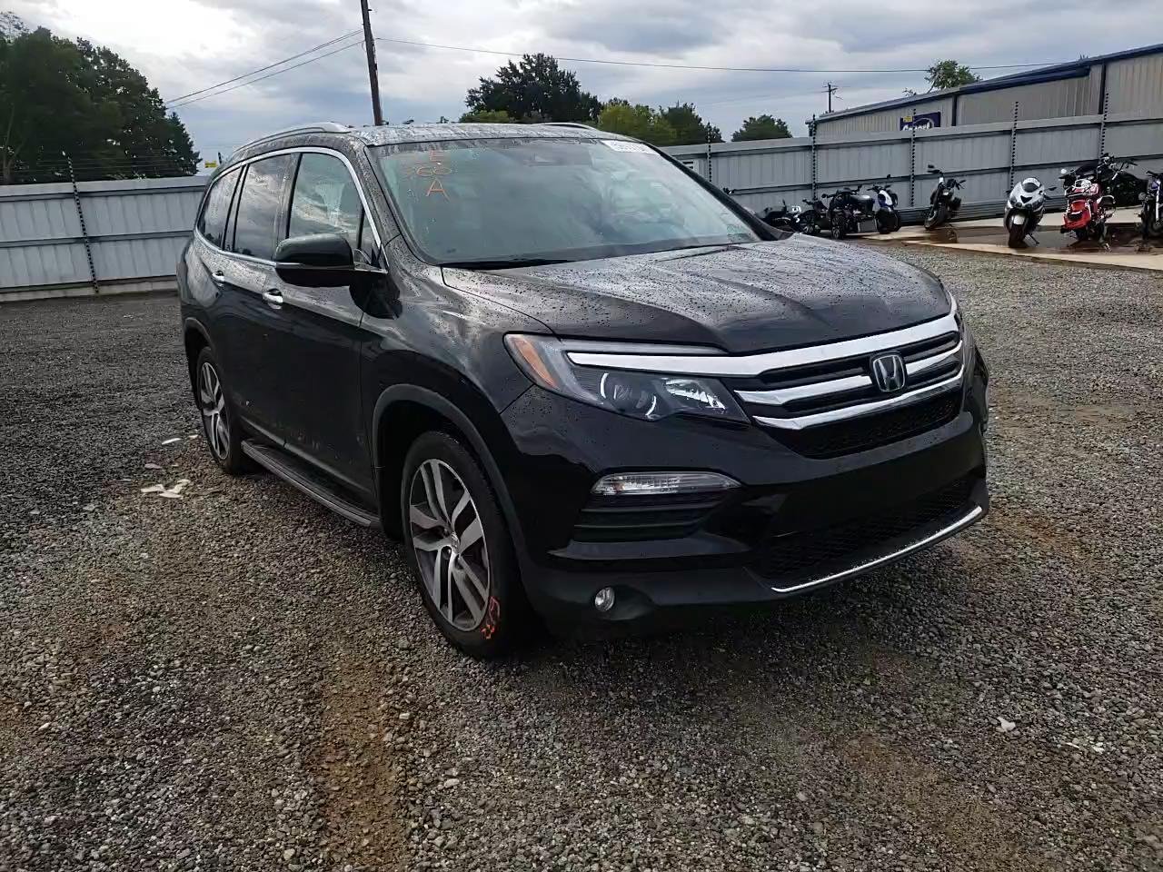 2018 HONDA PILOT ELIT 5FNYF6H07JB018555