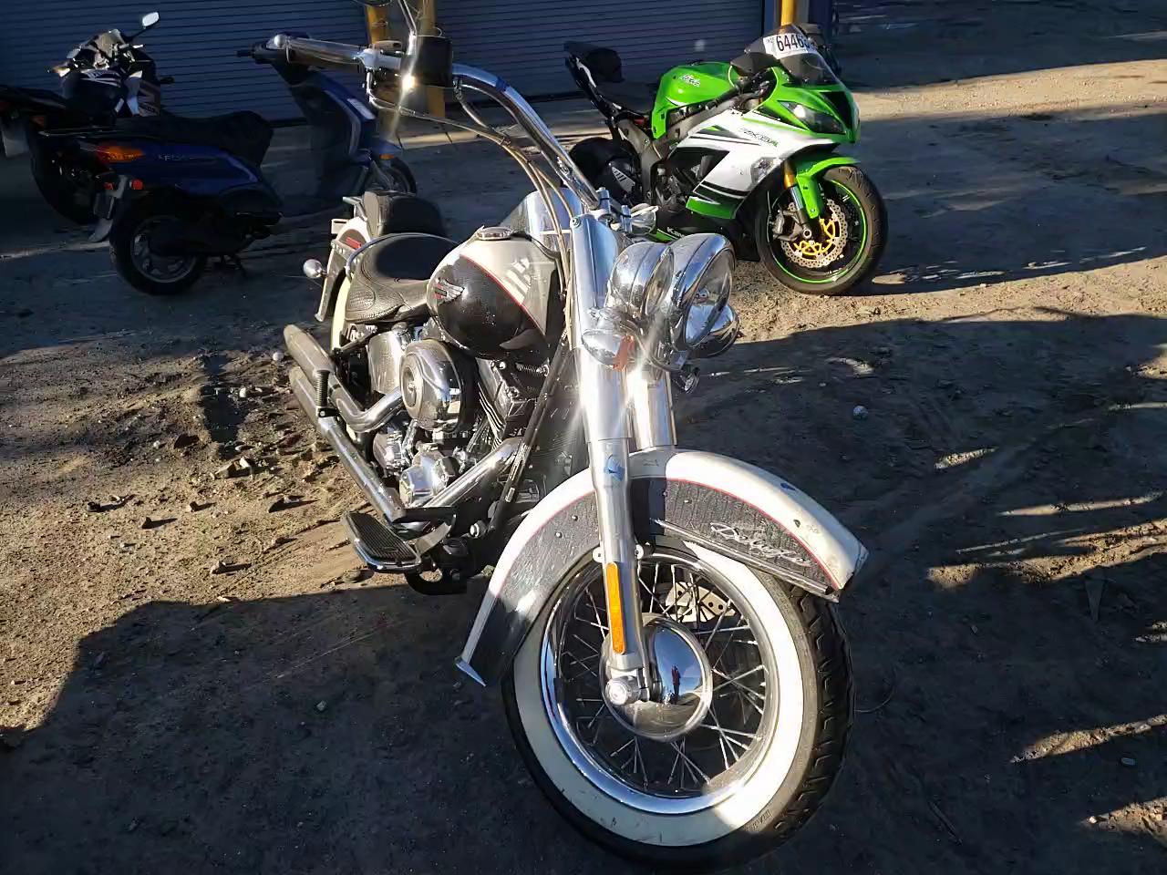 2011 HARLEY-DAVIDSON FLSTN 1HD1JD538BB015511