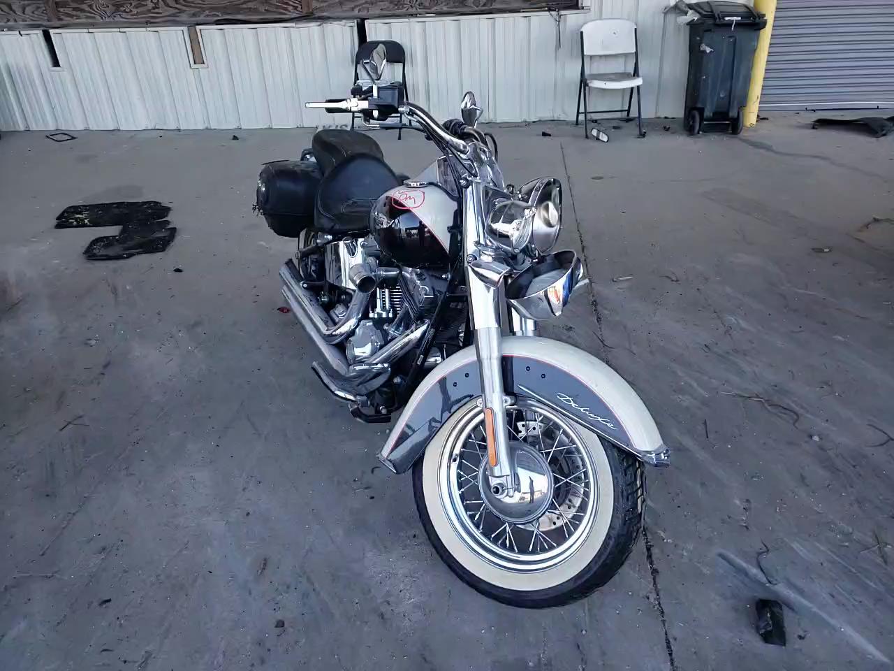 2011 HARLEY-DAVIDSON FLSTN 1HD1JD518BB044814