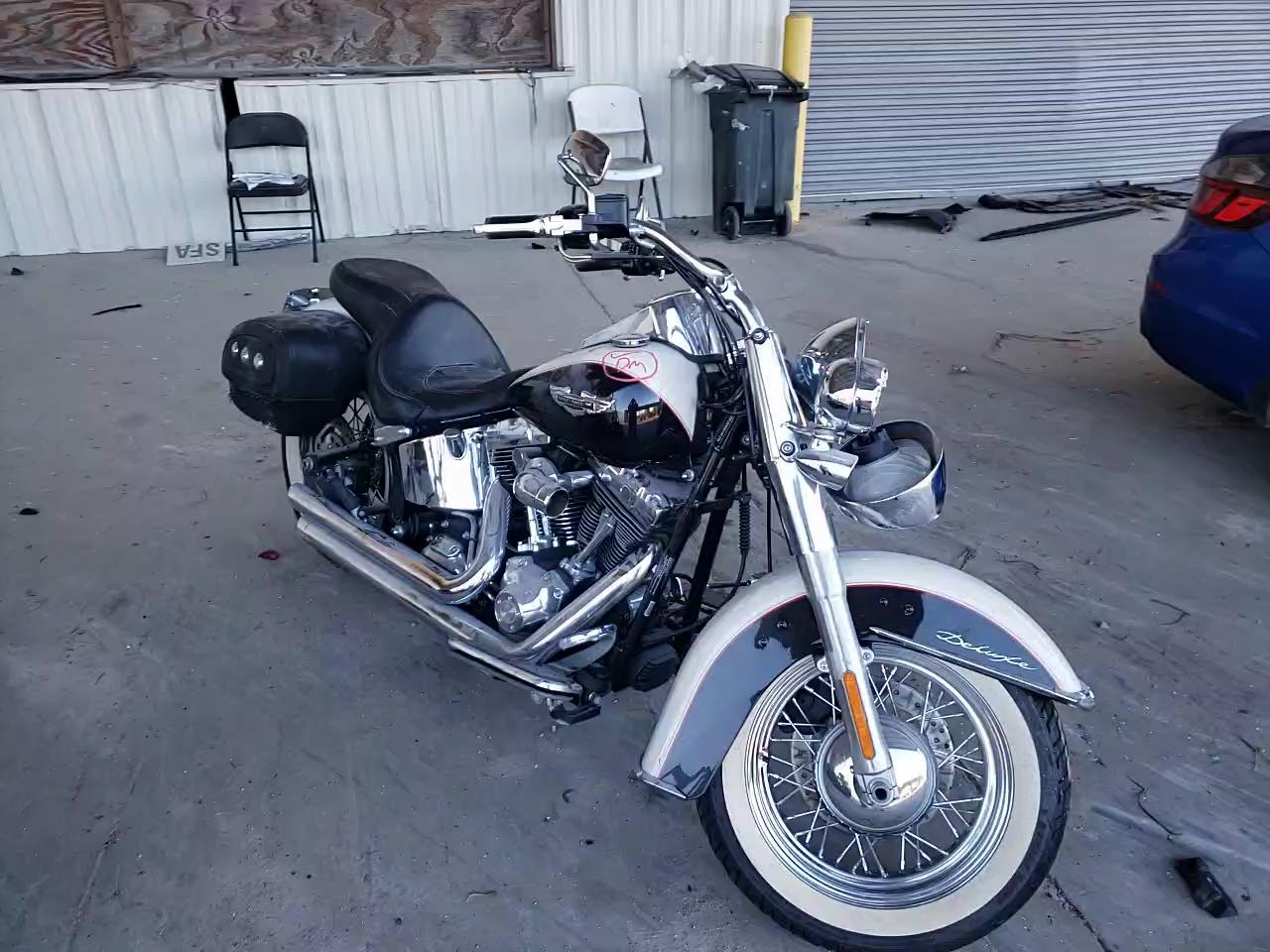 2011 HARLEY-DAVIDSON FLSTN 1HD1JD518BB044814