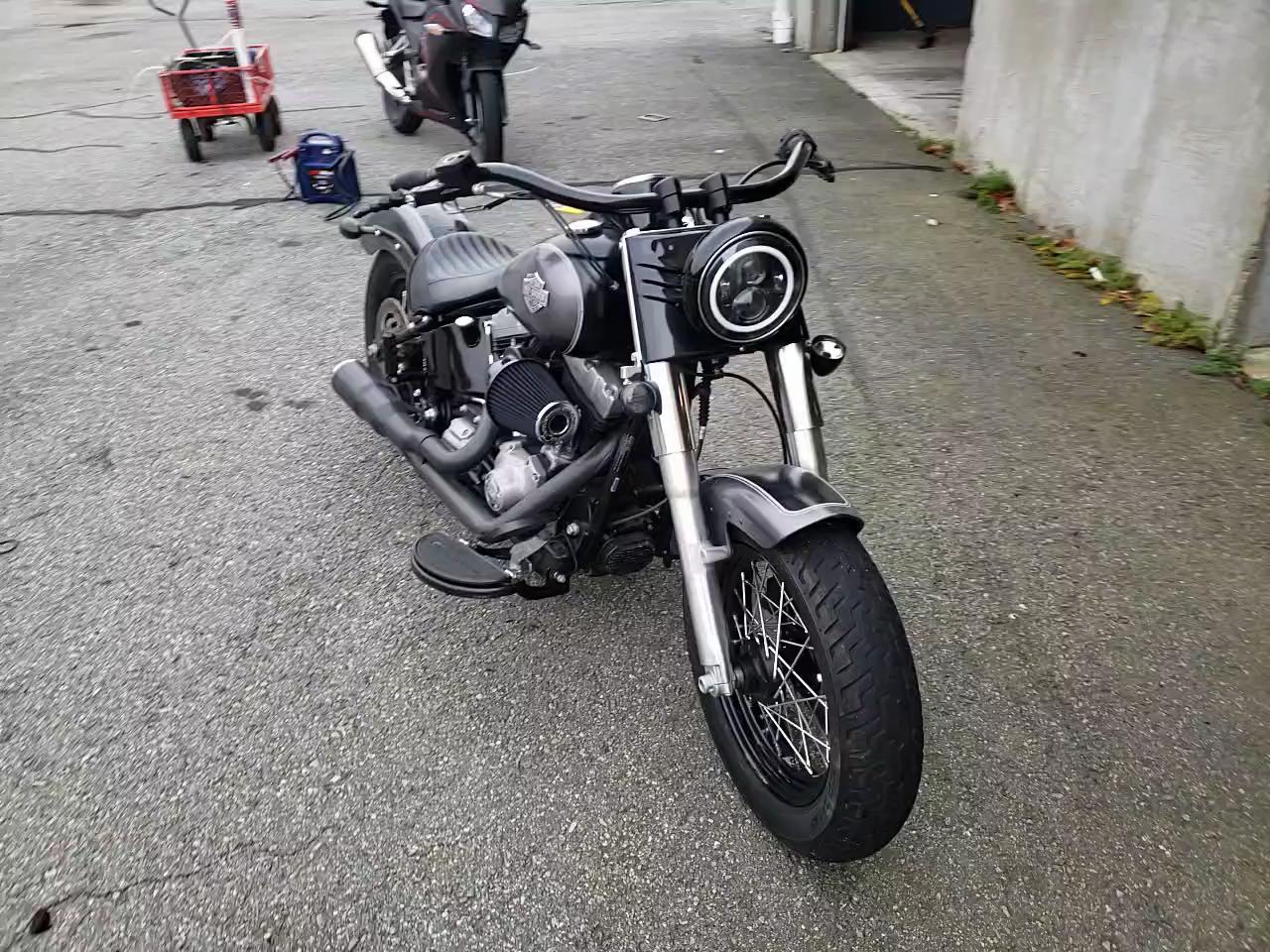 2014 HARLEY-DAVIDSON FLS SOFTAI 1HD1JRV18EB019302
