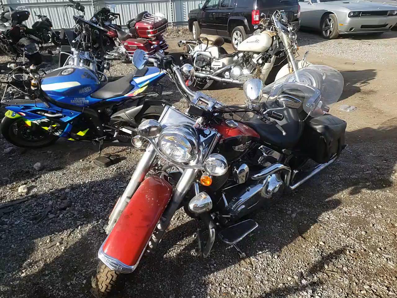 2010 HARLEY-DAVIDSON FLSTN 1HD1JD515AB028052