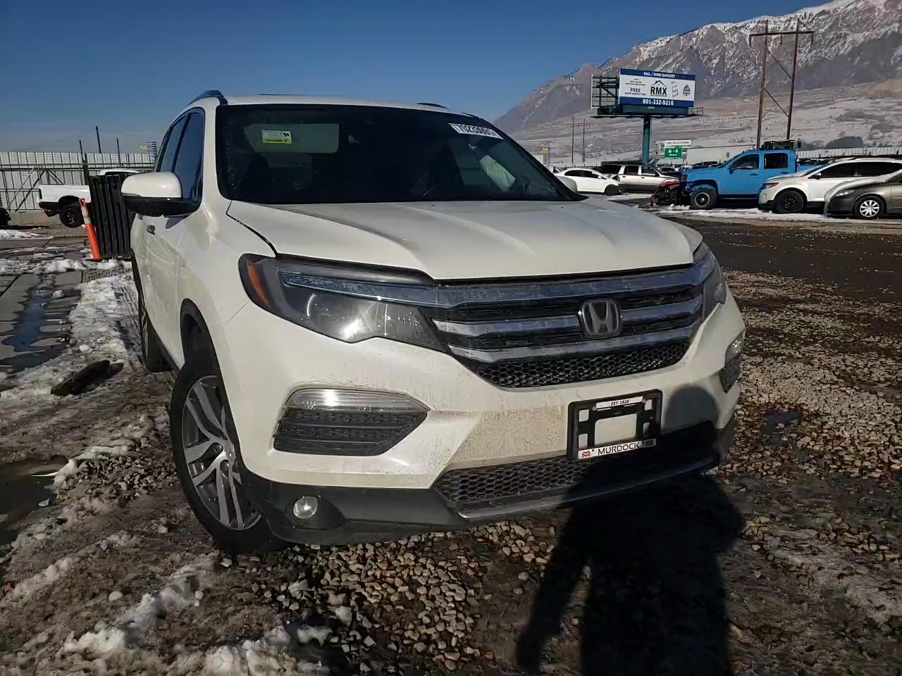 2017 HONDA PILOT ELIT 5FNYF6H06HB069877