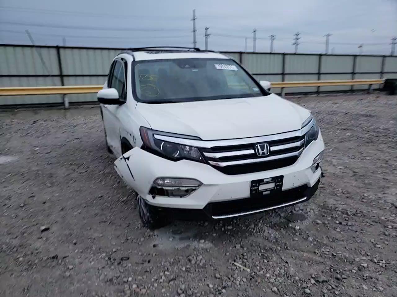 2018 HONDA PILOT ELIT 5FNYF6H05JB002709