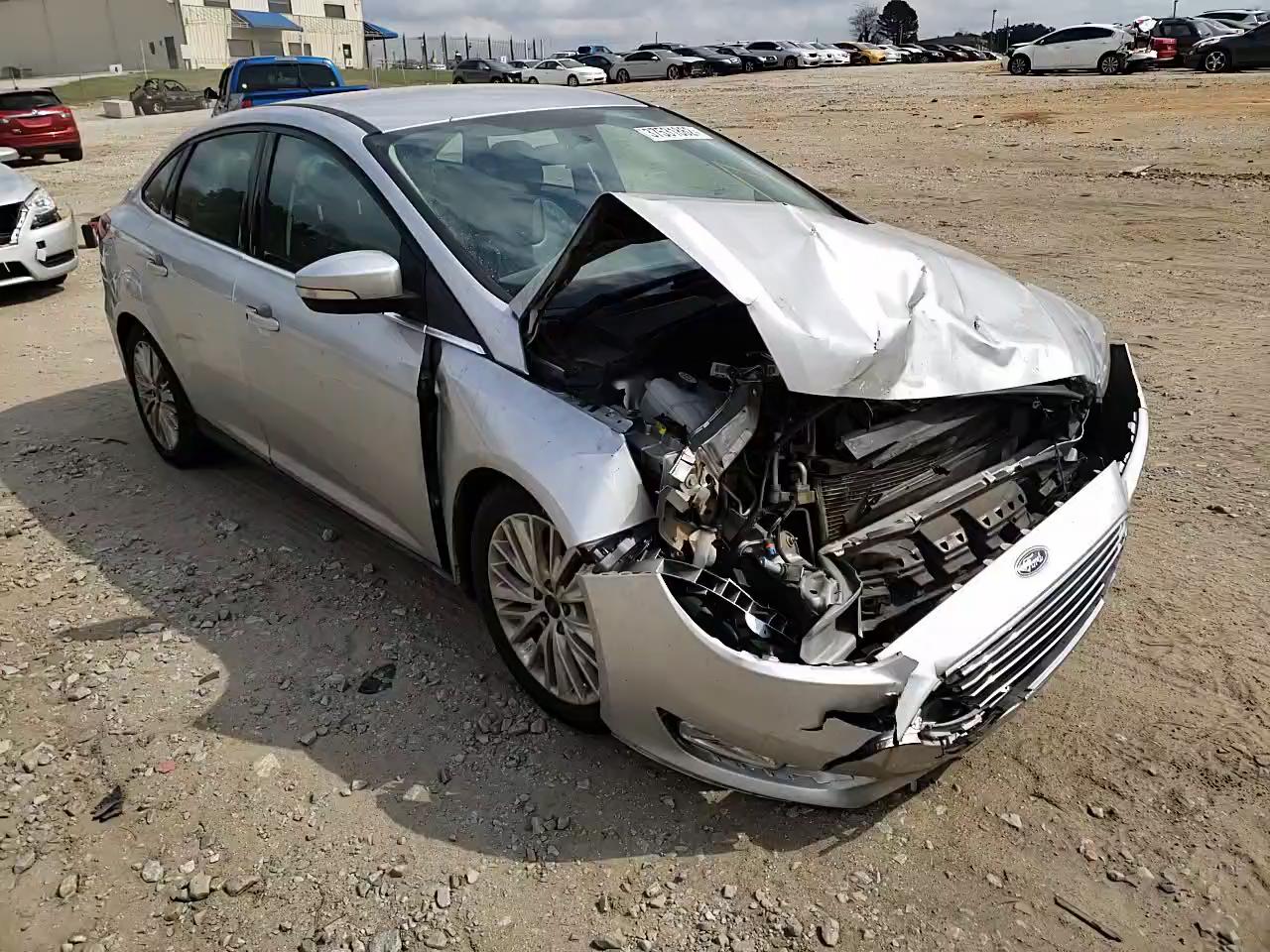 2015 FORD FOCUS TITA 1FADP3J24FL385865
