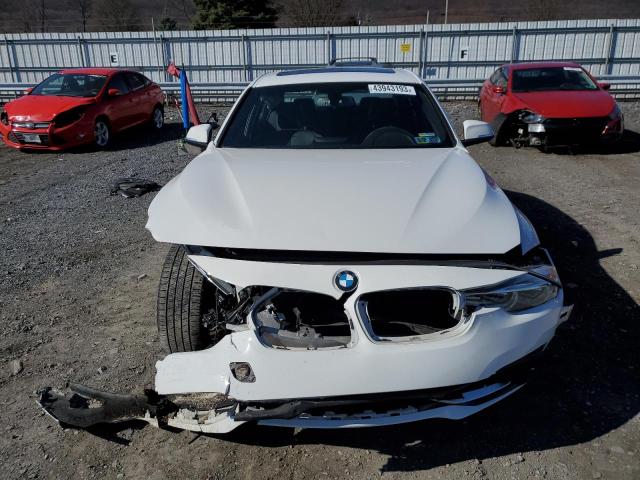 WBA8D9C56JEM34475 BMW 330 XI