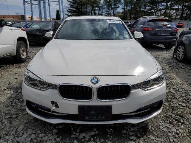 WBA8D9C59JEM34079 BMW 330 XI