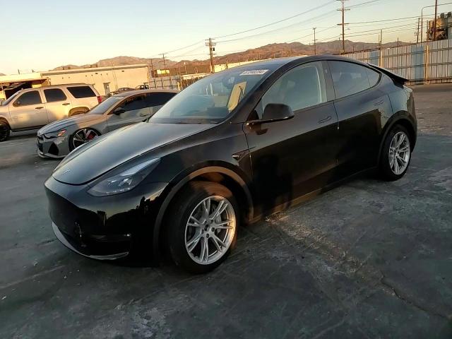 2024 Tesla Model Y VIN: 7SAYGAEEXRF063469 Lot: 87240234