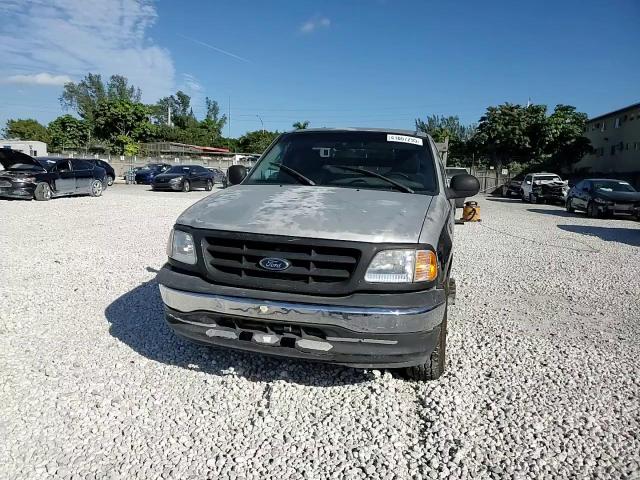 1999 Ford F150 VIN: 1FTRF17W0XKB76972 Lot: 41667295