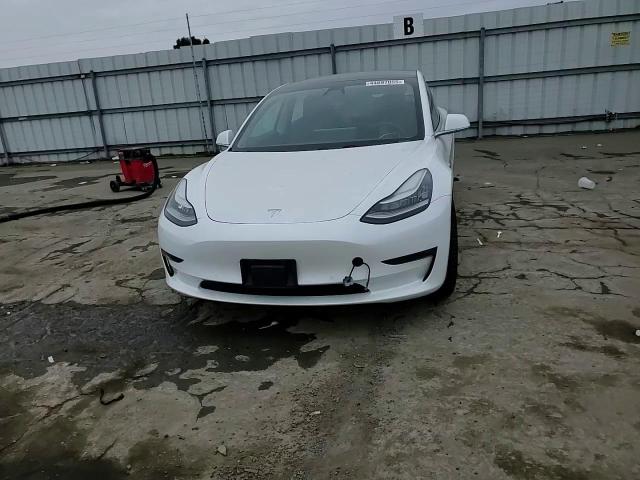 2019 Tesla Model 3 VIN: 5YJ3E1EA8KF338398 Lot: 44697055