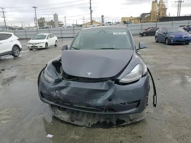 2023 Tesla Model Y VIN: 7SAYGDEE7PF927070 Lot: 44081085