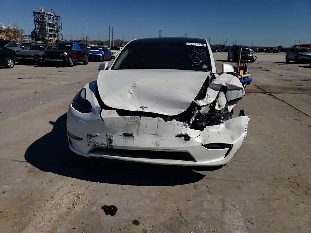 2023 Tesla Model Y VIN: 7SAYGAEE0PF686760 Lot: 52340645
