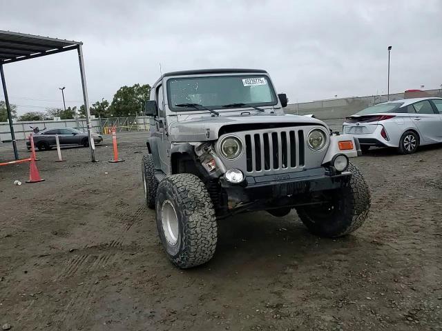 2000 Jeep Wrangler / Tj Sport VIN: 1J4FA49S8YP776795 Lot: 45239775