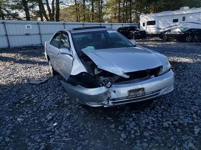 2003 Toyota Camry Le VIN: 4T1BE32K13U651060 Lot: 48150324