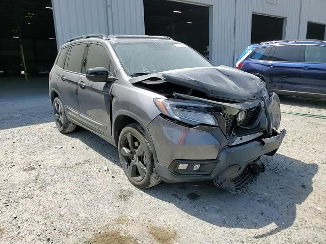 2021 Honda Passport Elite VIN: 5FNYF8H08MB014398 Lot: 50499375