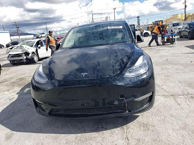 2023 Tesla Model Y VIN: 7SAYGDEE1PA057927 Lot: 86104204