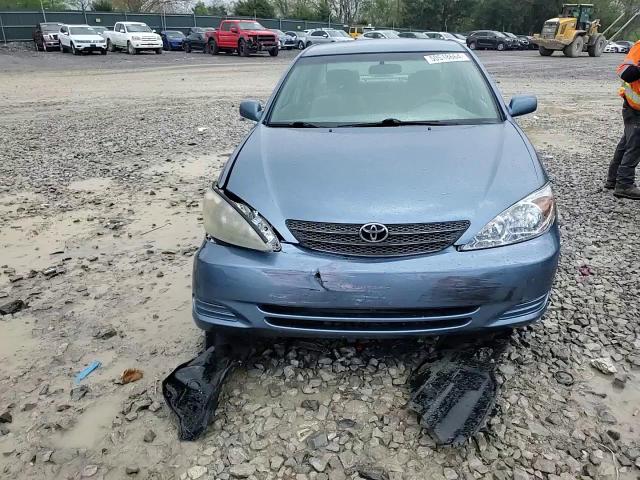 2002 Toyota Camry Le VIN: 4T1BE32KX2U573666 Lot: 65330894