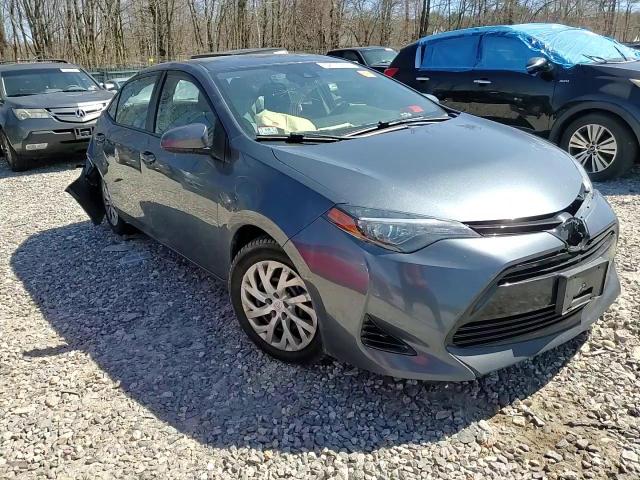 2018 Toyota Corolla L VIN: 2T1BURHE0JC087665 Lot: 52070834