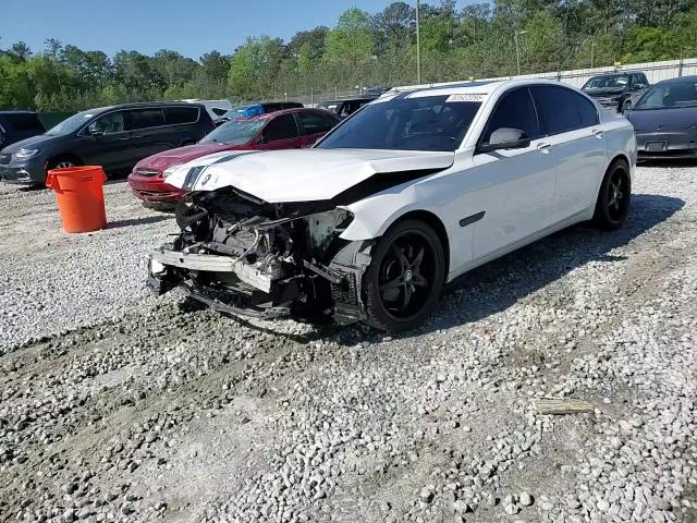 2014 BMW 740 I VIN: WBAYA6C58ED144242 Lot: 52522295