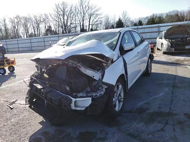 2014 Ford Focus Se VIN: 1FADP3F25EL406942 Lot: 65807045