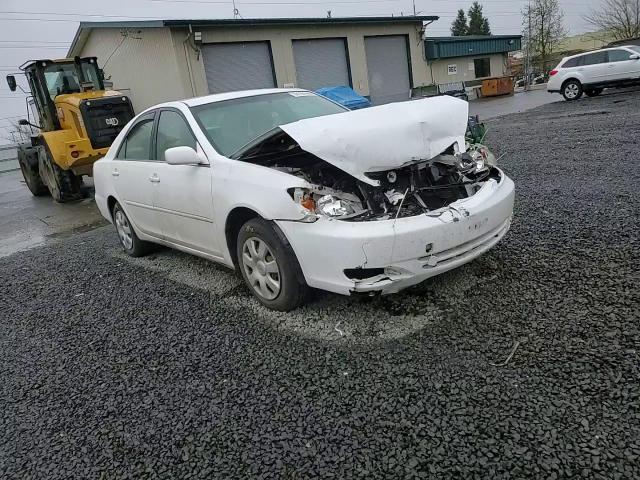 2003 Toyota Camry Le VIN: JTDBE32KX30145206 Lot: 52165395