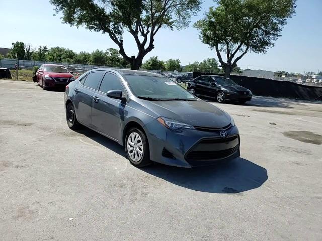 2018 Toyota Corolla L VIN: 5YFBURHEXJP807859 Lot: 53272915