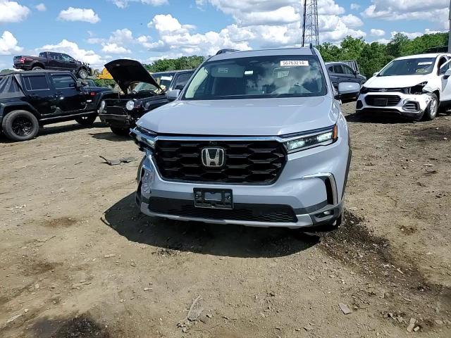 2023 Honda Pilot Elite VIN: 5FNYG1H82PB034130 Lot: 56763214