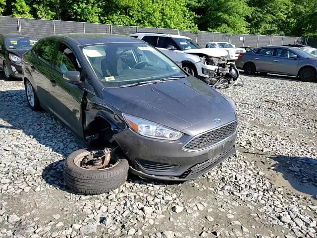 2018 Ford Focus Se VIN: 1FADP3F23JL298055 Lot: 55694374