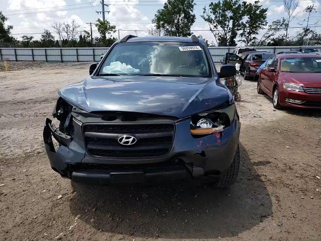 2009 Hyundai Santa Fe Gls VIN: 5NMSG13D99H272682 Lot: 56859974