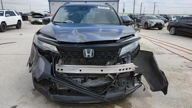 2020 Honda Passport Touring VIN: 5FNYF7H94LB003860 Lot: 58833295