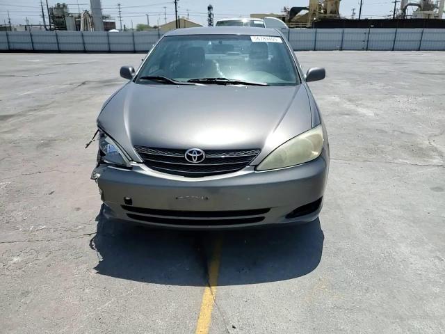 2003 Toyota Camry Le VIN: JTDBE32K630181023 Lot: 56789405