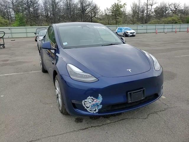 2023 Tesla Model Y VIN: 7SAYGDEE7PF893695 Lot: 56712845