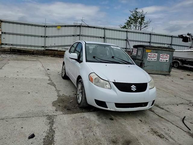 2011 Suzuki Sx4 Le VIN: JS2YC5A24B6303229 Lot: 55670405