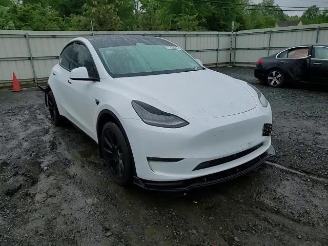 2023 Tesla Model Y VIN: 7SAYGDEEXPA158674 Lot: 57720555