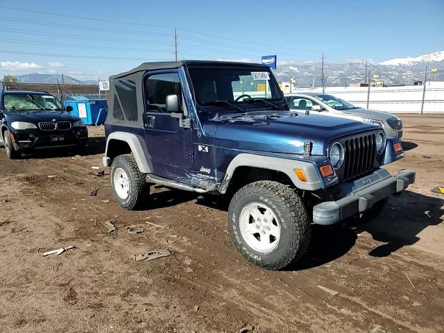 2003 Jeep Wrangler Commando VIN: 1J4FA39S43P338732 Lot: 56315495