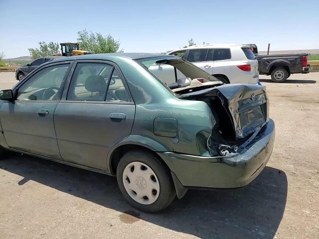 2000 Mazda Protege Dx VIN: JM1BJ222XY0275662 Lot: 57160195