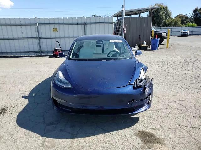 2018 Tesla Model 3 VIN: 5YJ3E1EB8JF080780 Lot: 57095905