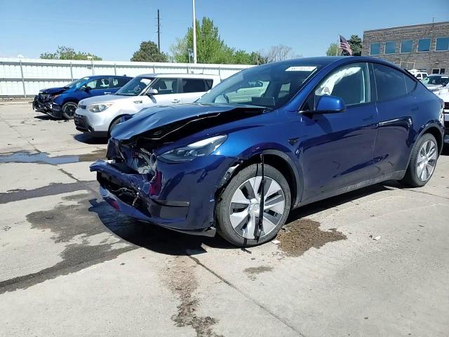 2023 Tesla Model Y VIN: 7SAYGDEEXPF867625 Lot: 56374025