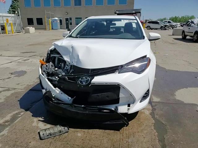 2018 Toyota Corolla L VIN: 2T1BURHE8JC071827 Lot: 57110225