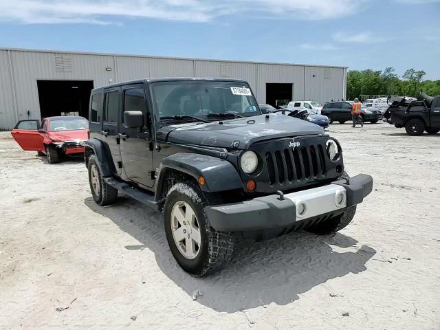 2010 Jeep Wrangler Unlimited Sahara VIN: 1J4BA5H10AL166805 Lot: 57134885