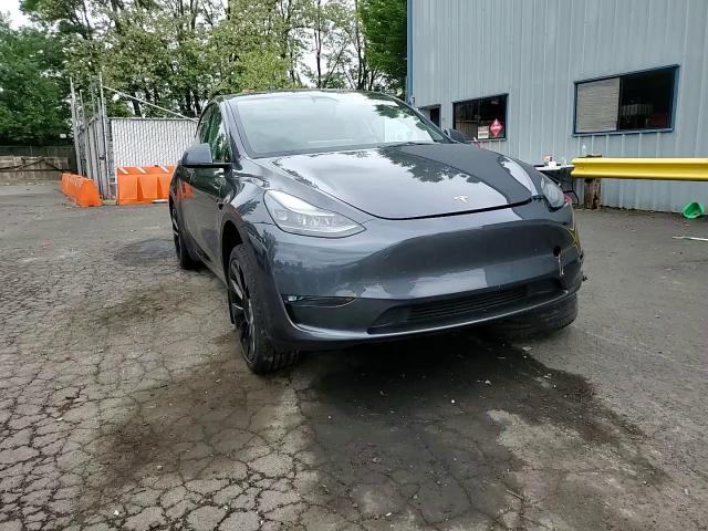 2023 Tesla Model Y VIN: 7SAYGDEE3PF870754 Lot: 56991315