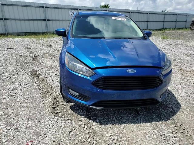 2018 Ford Focus Se VIN: 1FADP3FE2JL293021 Lot: 56907095