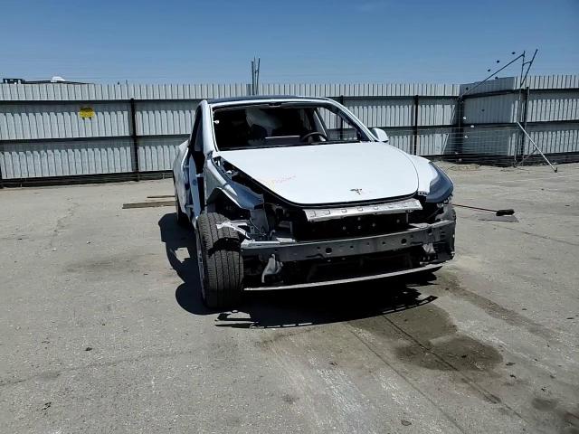 2023 Tesla Model Y VIN: 7SAYGDED4PF934193 Lot: 57041595