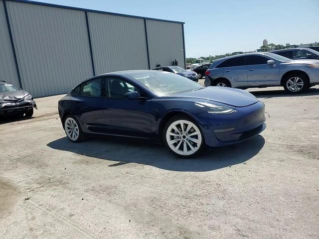 2023 Tesla Model 3 VIN: 5YJ3E1EA4PF447125 Lot: 57049045