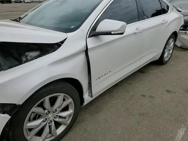 2017 Chevrolet Impala Lt VIN: 1G1105S3XHU214175 Lot: 57273335