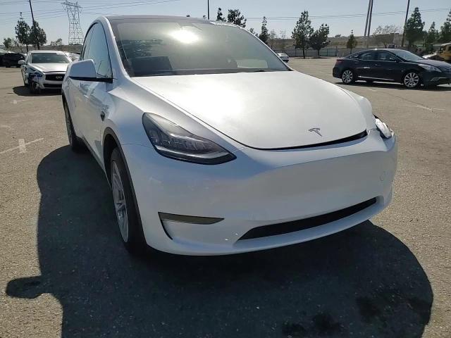 2023 Tesla Model Y VIN: 7SAYGDEE8PA094621 Lot: 56987365